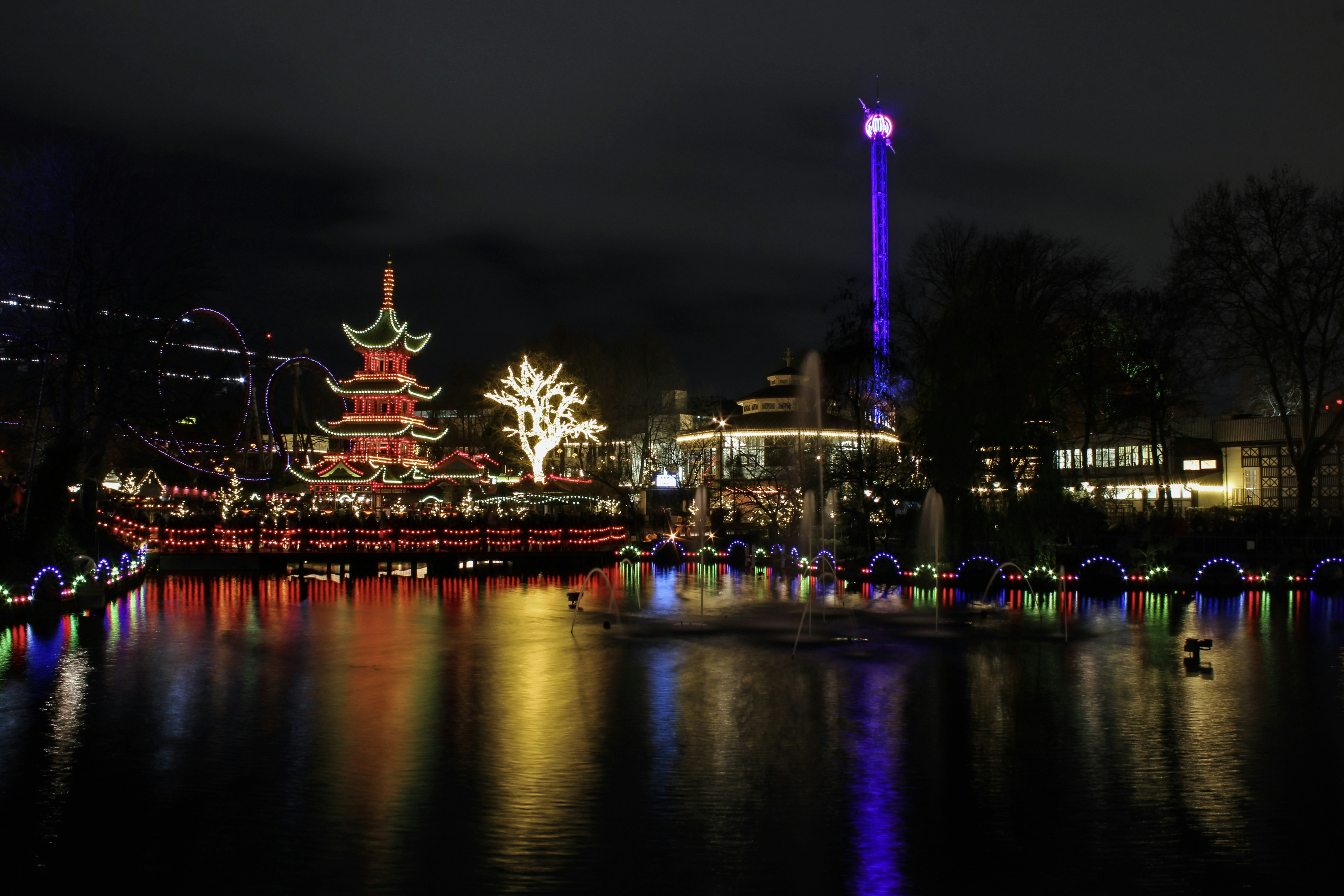 Tivoli Gardens illuminated at night in Copenhagen, Denmark
